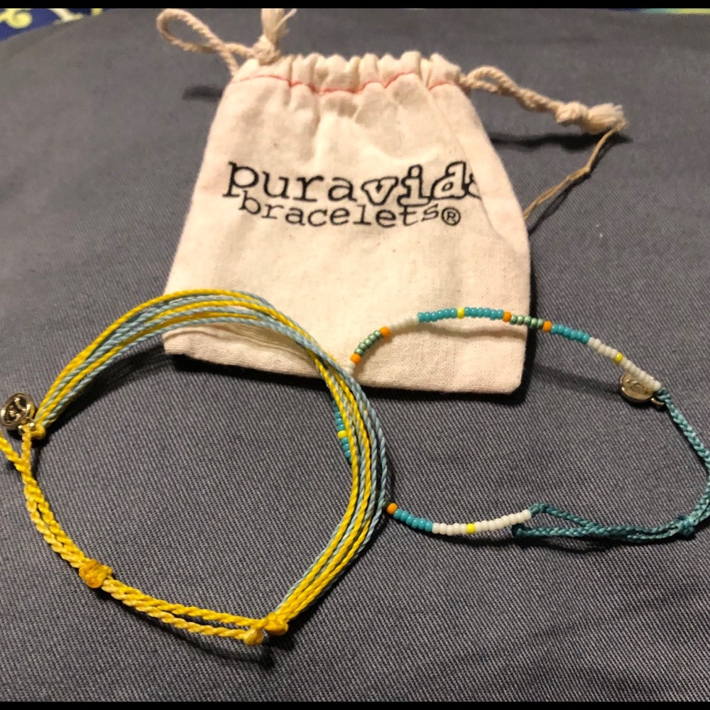 Two Pura vida bracelets in citrus colors. GUC.